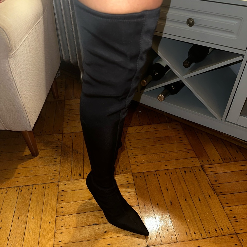 Zara thigh high black boots 
Size: 41 (10 US)